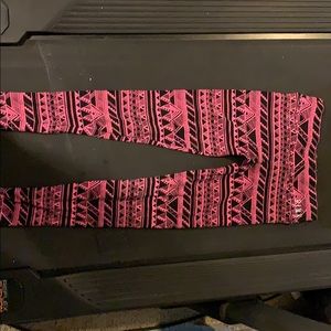 Pink and black leggings seem in good shape